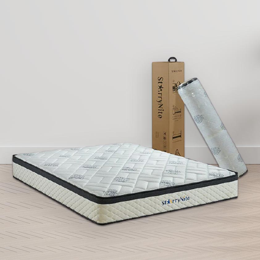 StarryNite Mattress with packaging box and bolster behind it